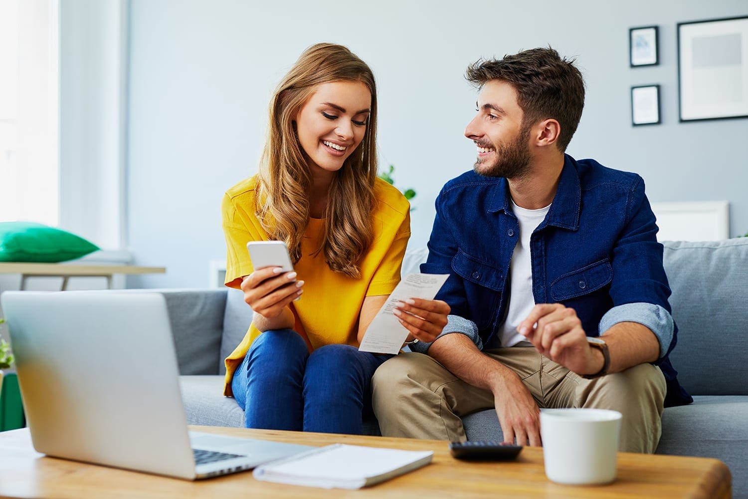 Young Couple Asset Valuations - Happy Managing budget